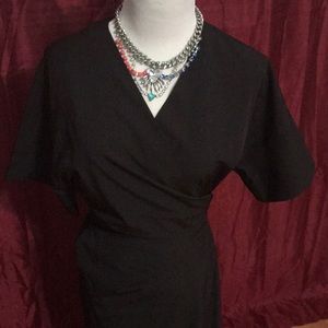 Hard to pic this dress. Wrap style.